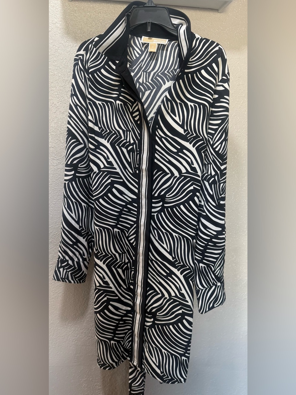 Michael Kors zebra print long sleeve shirt dress
featuring a tie waist